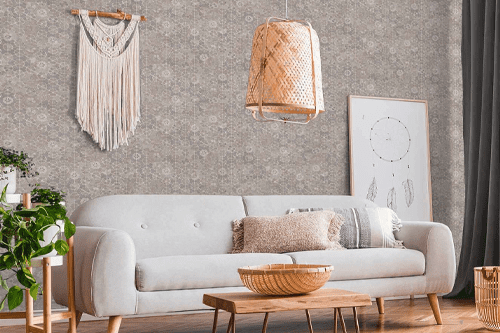 Tapete im Boho Stil hinter einem weißen Sofa